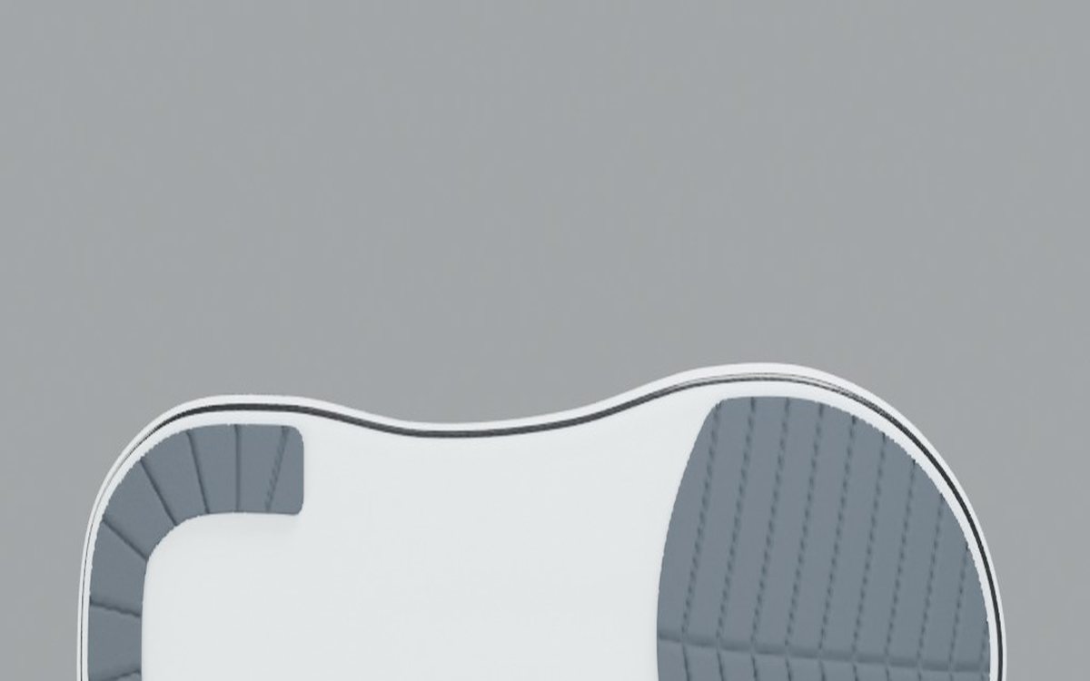 Outsole view: chevron-siped forefoot rubber pad and lateral heel crescent on bare foam